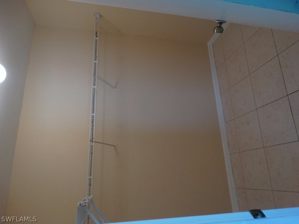 7227 Coolidge Road Fort Myers, FL 33967 - Photo 14 of 24 a view of a rack on the wall