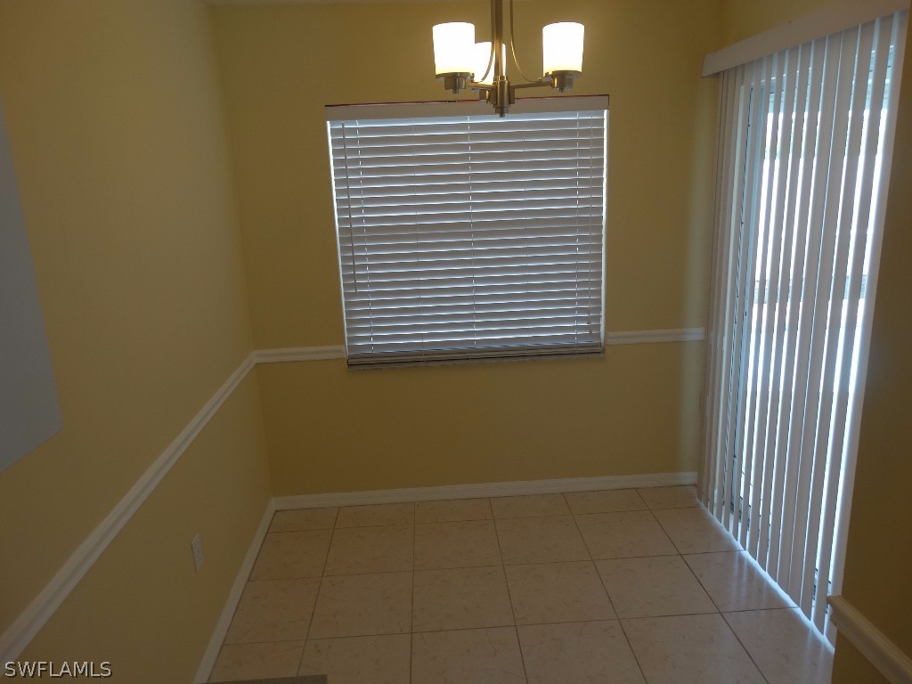 7227 Coolidge Road Fort Myers, FL 33967 - Photo 17 of 24 a view of a room with a window