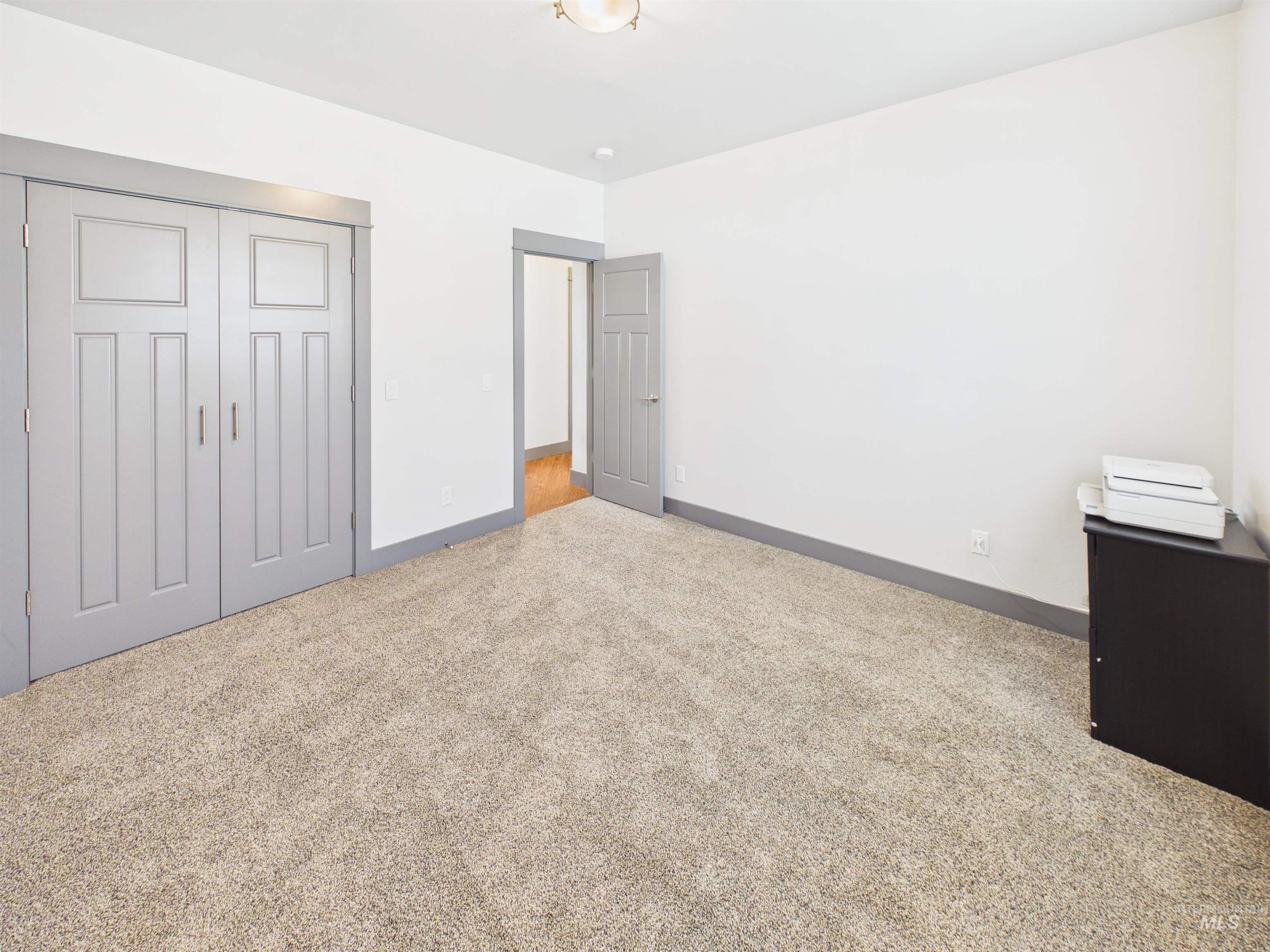 503 Heron Way Rupert, ID 83350 - Photo 28 of 49 Unfurnished bedroom featuring carpet and a closet