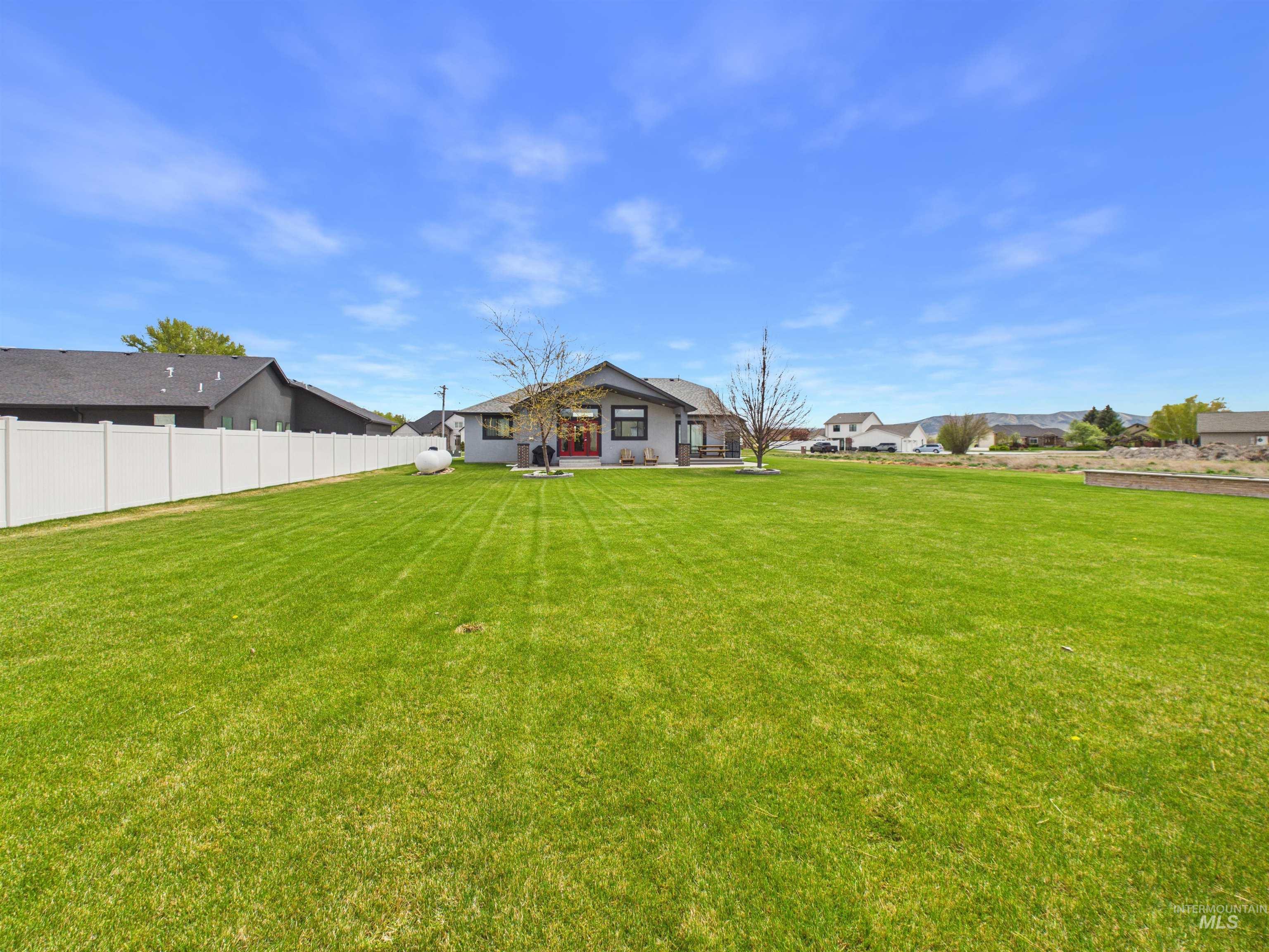 503 Heron Way Rupert, ID 83350 - Photo 43 of 49 Rear view of house featuring a residential view