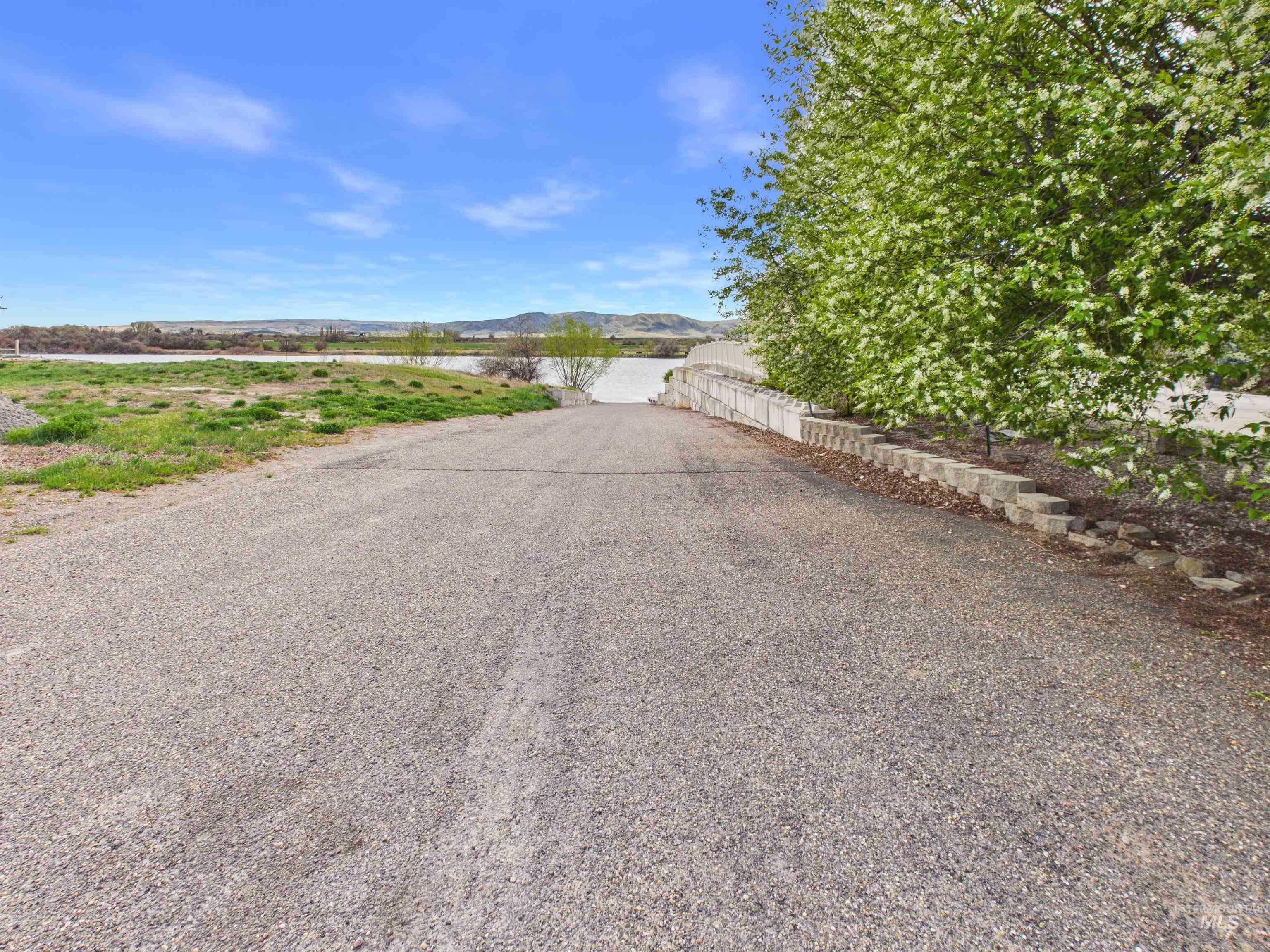 503 Heron Way Rupert, ID 83350 - Photo 46 of 49 View of asphalt road featuring a mountain view and a boat ramp