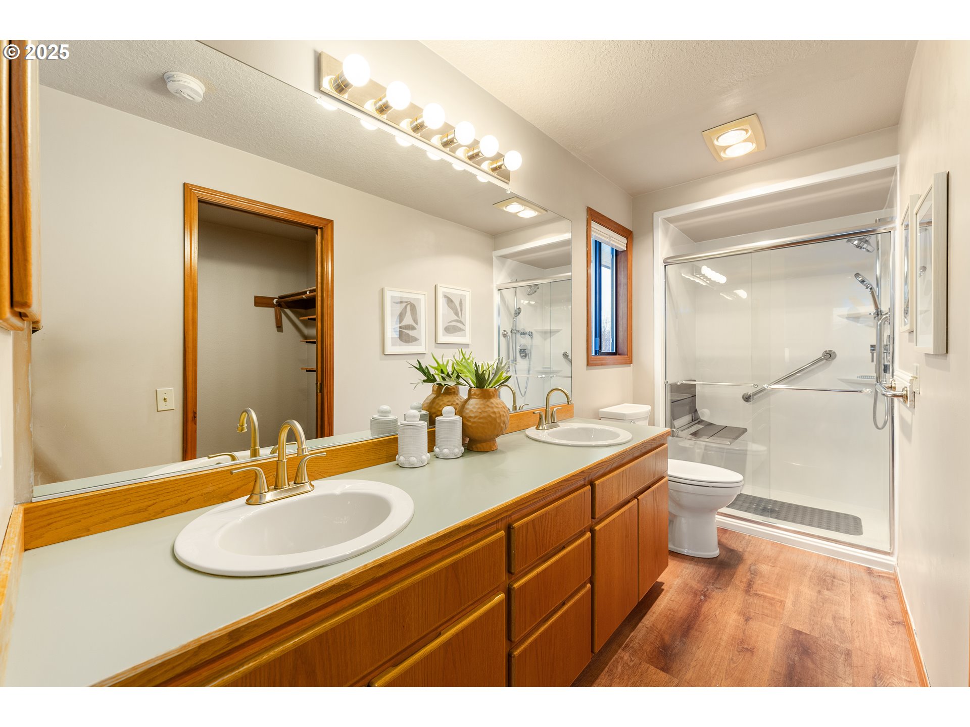 2315 Northeast 156th Place Portland, OR 97230 - Photo 15 of 25 a bathroom with a sink a toilet and a mirror