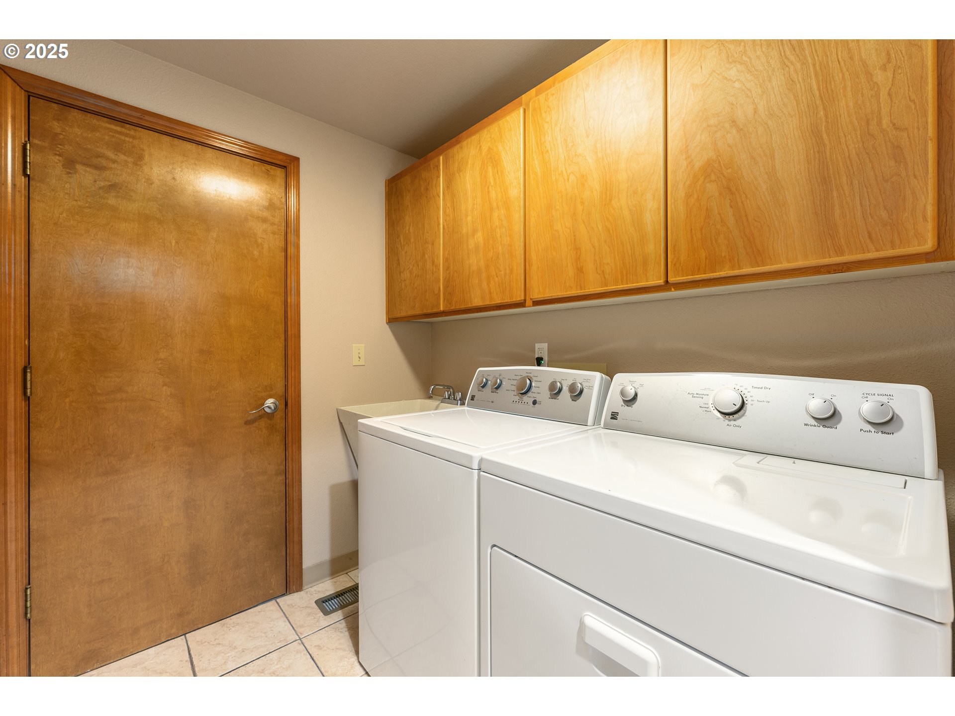 2315 Northeast 156th Place Portland, OR 97230 - Photo 22 of 25 a utility room with dryer and washer