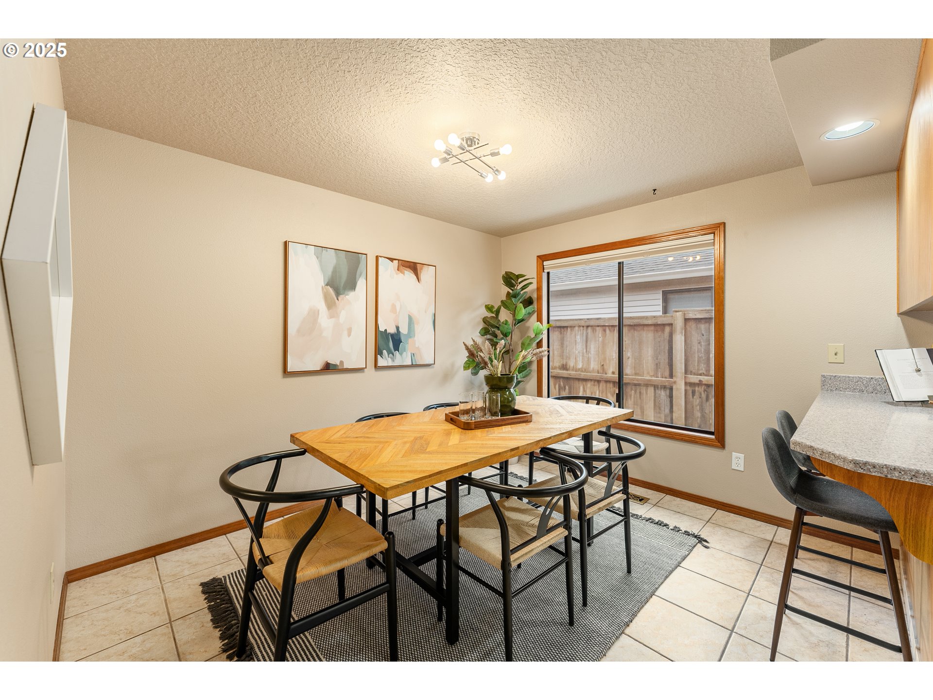 2315 Northeast 156th Place Portland, OR 97230 - Photo 9 of 25 a view of a dining room with furniture and wooden floor