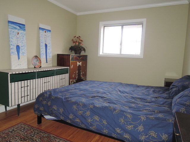 124 East Bailey Road, Unit L Naperville, IL 60565 - Photo 13 of 19 a bedroom with a bed and a window