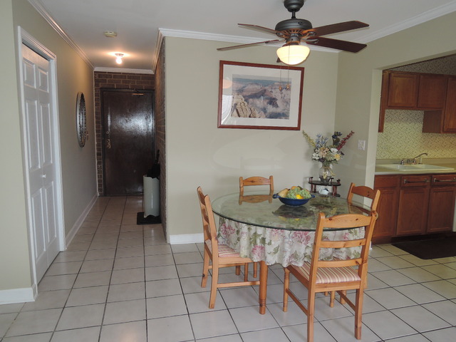 124 East Bailey Road, Unit L Naperville, IL 60565 - Photo 7 of 19 a view of a dining room with furniture