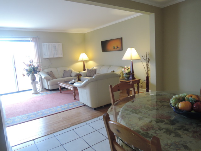124 East Bailey Road, Unit L Naperville, IL 60565 - Photo 8 of 19 a living room with furniture