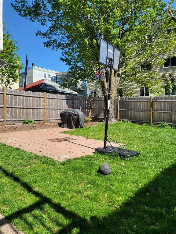 12 Watts Street, Unit 1 Chelsea, MA 02150 - Photo 25 of 29 a view of a kid s in front of a house