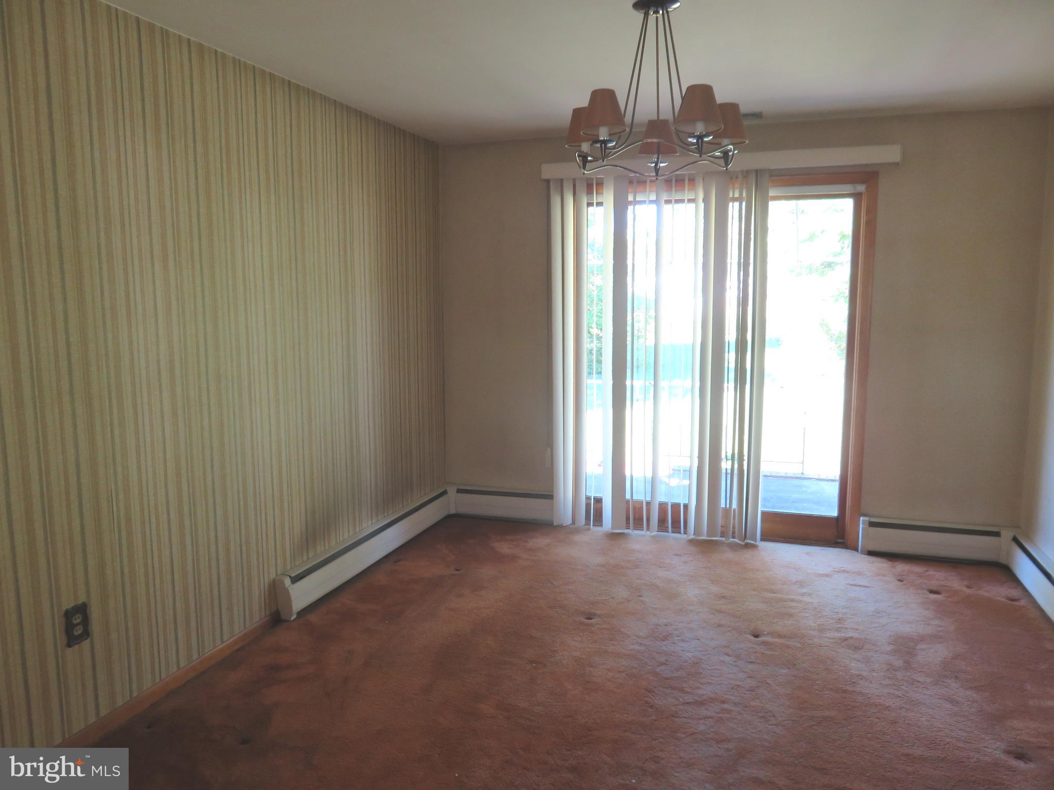 9819 Fox Hill Road Perry Hall, MD 21128 - Photo 6 of 21 DINING ROOM LEADING TO PORCH/YARD