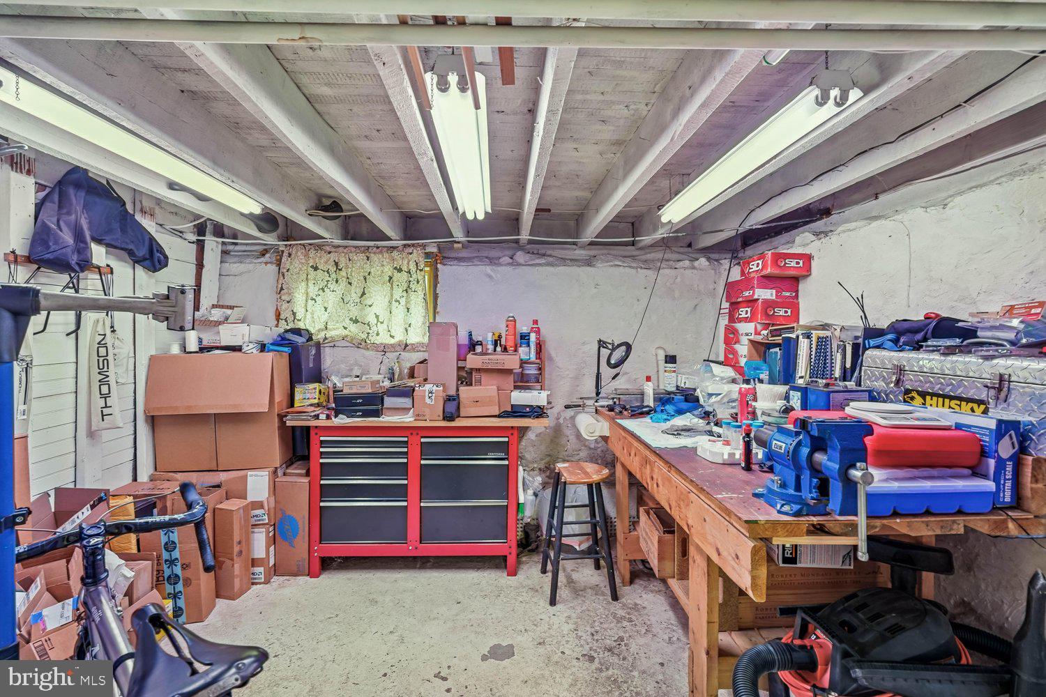 16 Maple Avenue Washington Grove, MD 20880 - Photo 42 of 58 Spacious workshop with organized chaos.