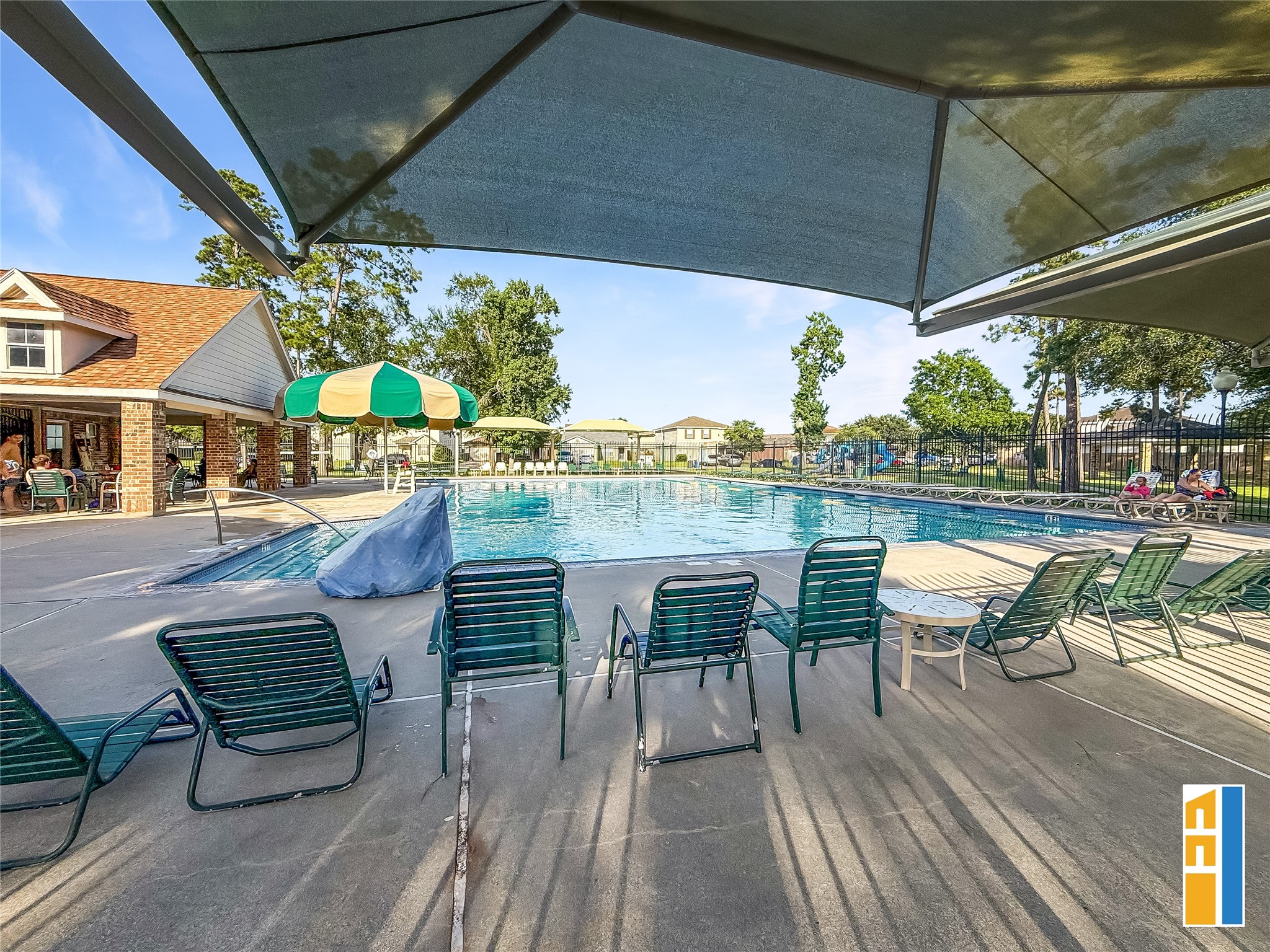 29566 North Legends Bend Drive Spring, TX 77386 - Photo 4 of 21 Enjoy the luxury of having a community pool right next door, perfect for relaxation and summer fun.