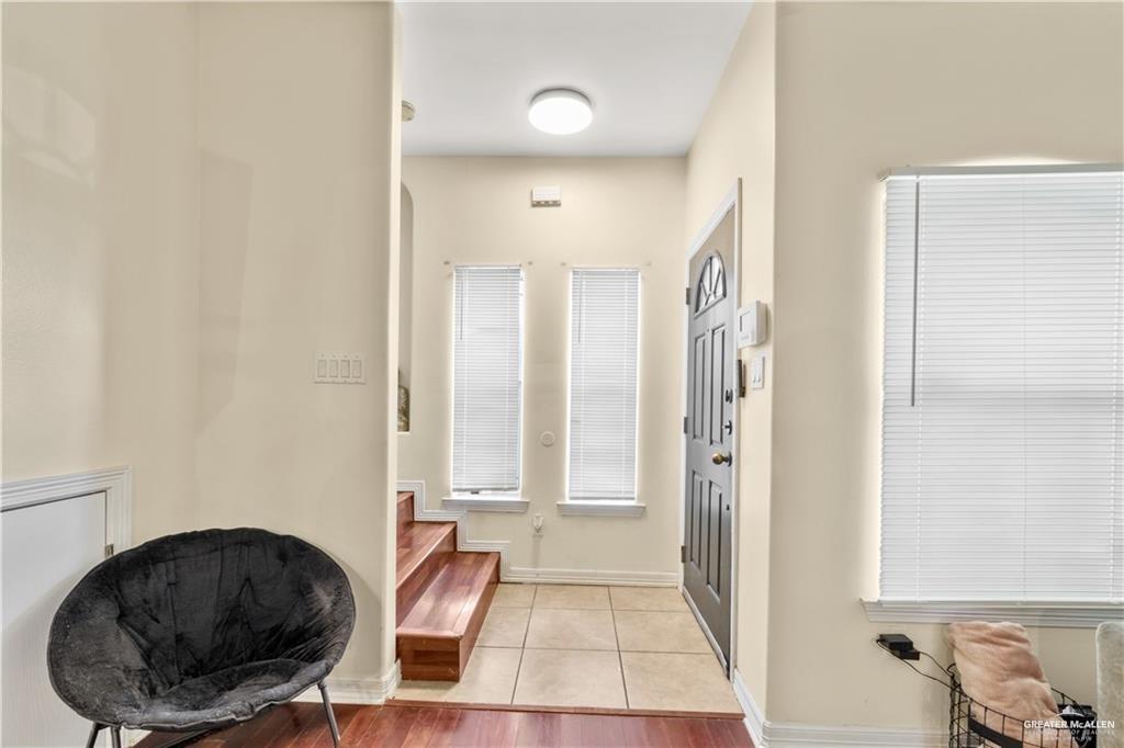 1309 West Fig Avenue, Unit C Pharr, TX 78577 - Photo 3 of 20 a view of a livingroom with furniture and front door