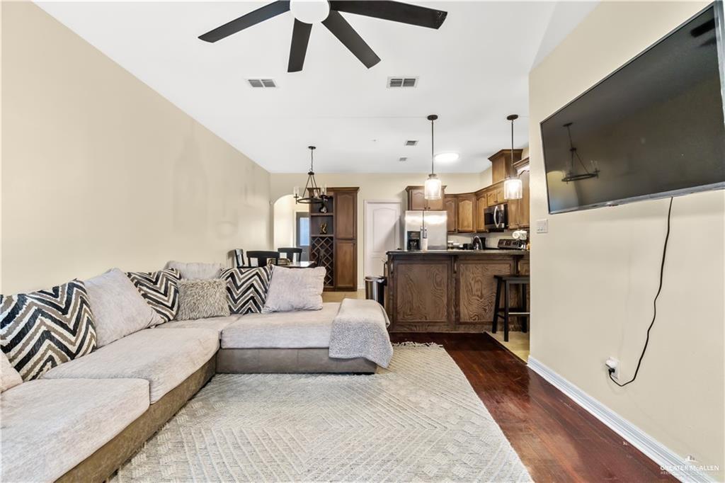 1309 West Fig Avenue, Unit C Pharr, TX 78577 - Photo 5 of 20 a living room with furniture and kitchen view