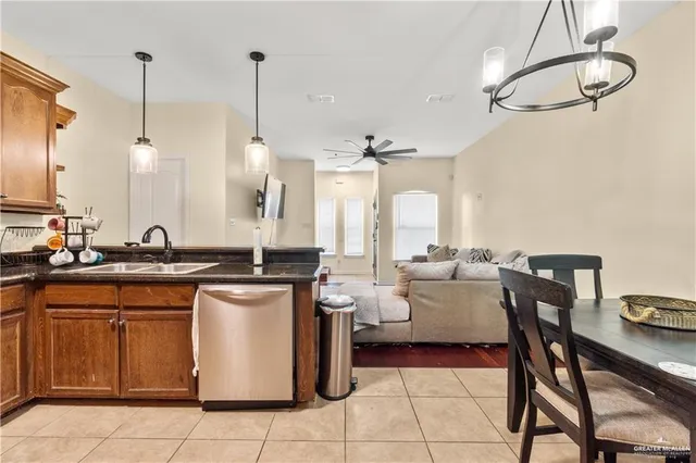 a kitchen with a sink counter top space and appliances