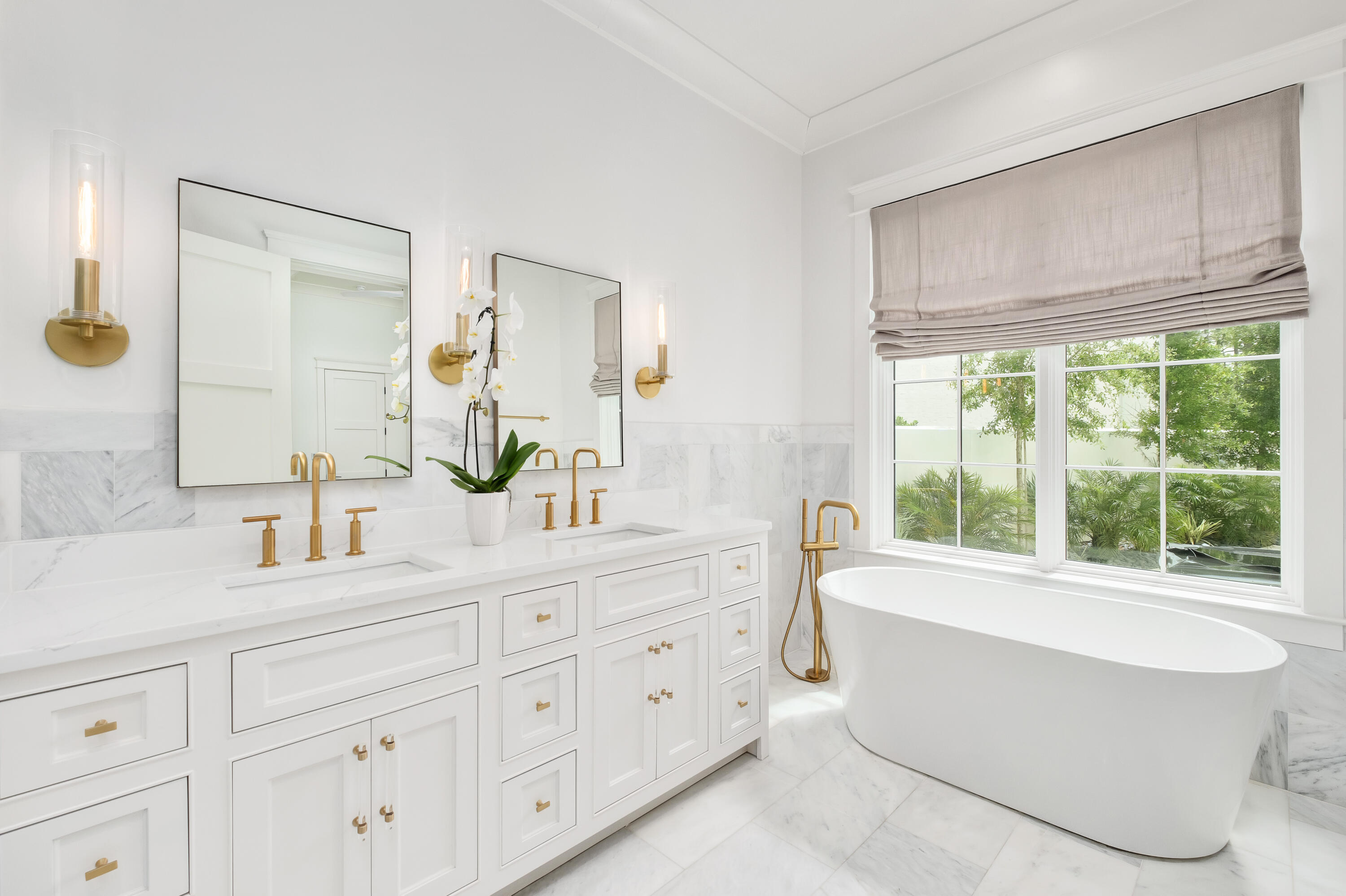 83 Tyler Drive Santa Rosa Beach, FL 32459 - Photo 28 of 68 a bathroom with a double vanity sink a mirror a bathtub and window