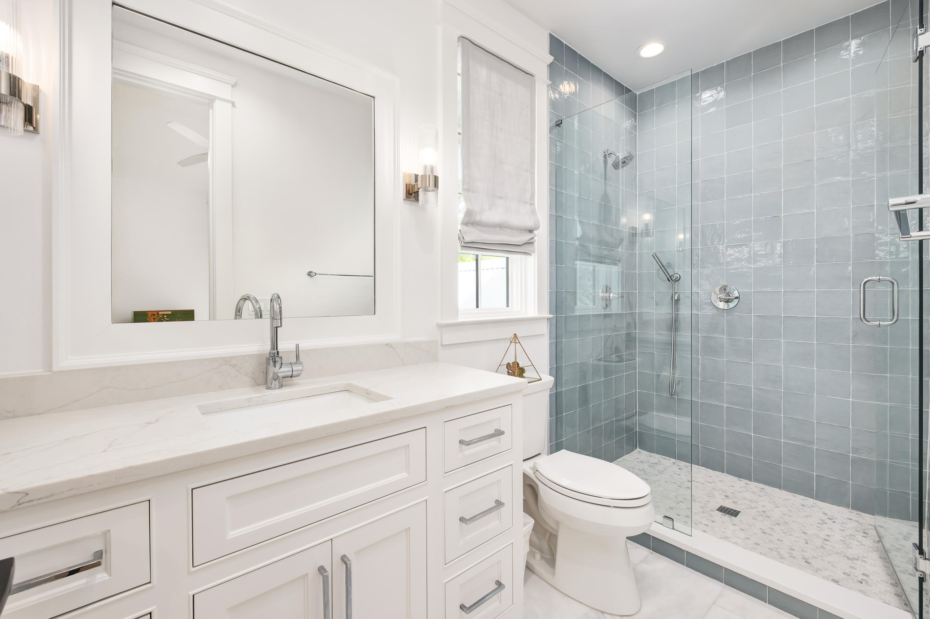83 Tyler Drive Santa Rosa Beach, FL 32459 - Photo 38 of 68 a bathroom with a sink a toilet and shower