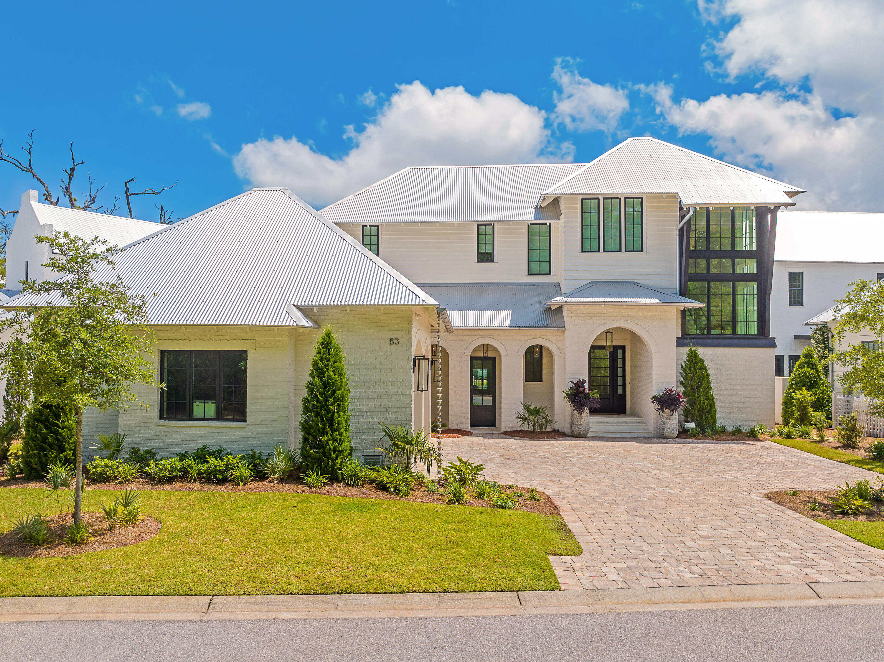 83 Tyler Drive Santa Rosa Beach, FL 32459 - Photo 52 of 68 a front view of house with yard and outdoor seating