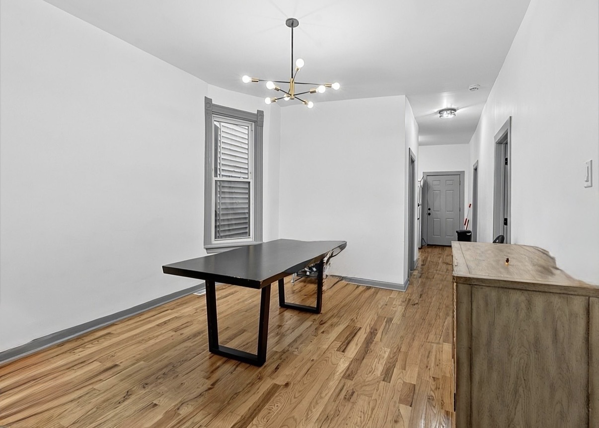 6602 South Marquette Road Chicago, IL 60637 - Photo 16 of 24 a view of a livingroom with furniture and wooden floor