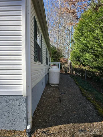 a view of a back yard of the house
