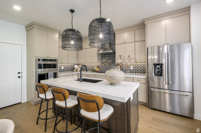 267 Fushion Lane Draper, UT 84020 - Photo 10 of 26 Cook, entertain, or grab a quick snack—this kitchen is built for real life. *Model Home Photo