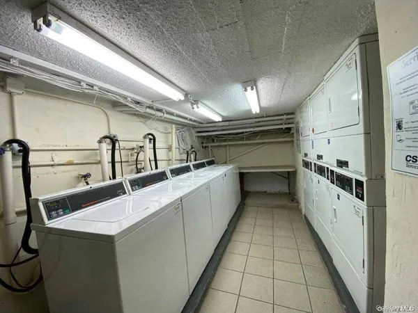 a storage room with washer and dryer