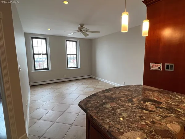 a view of an empty room and window