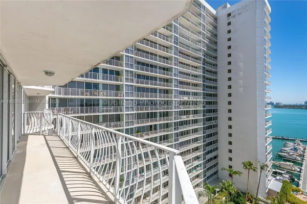 a view of balcony with a potted plant