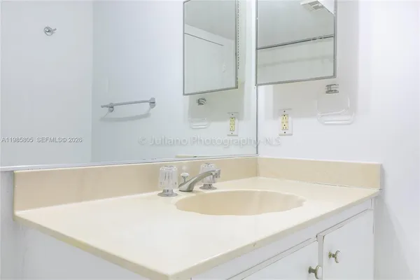 a bathroom with a sink and a bathtub