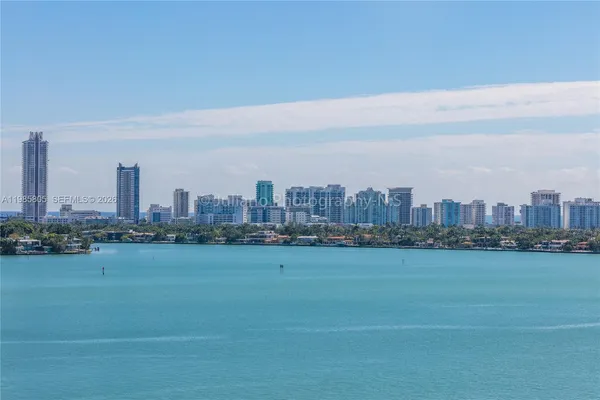 a view of a city with tall buildings in the background