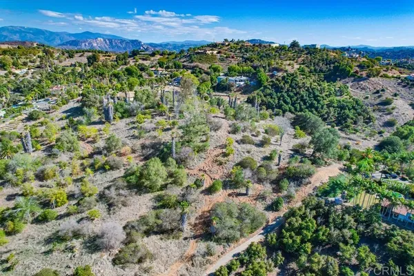 an aerial view of residential house with outdoor space