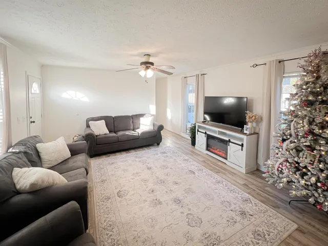 a bedroom with a bed and a view of bathroom