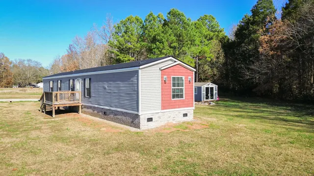 a view of a swimming pool with a lake view