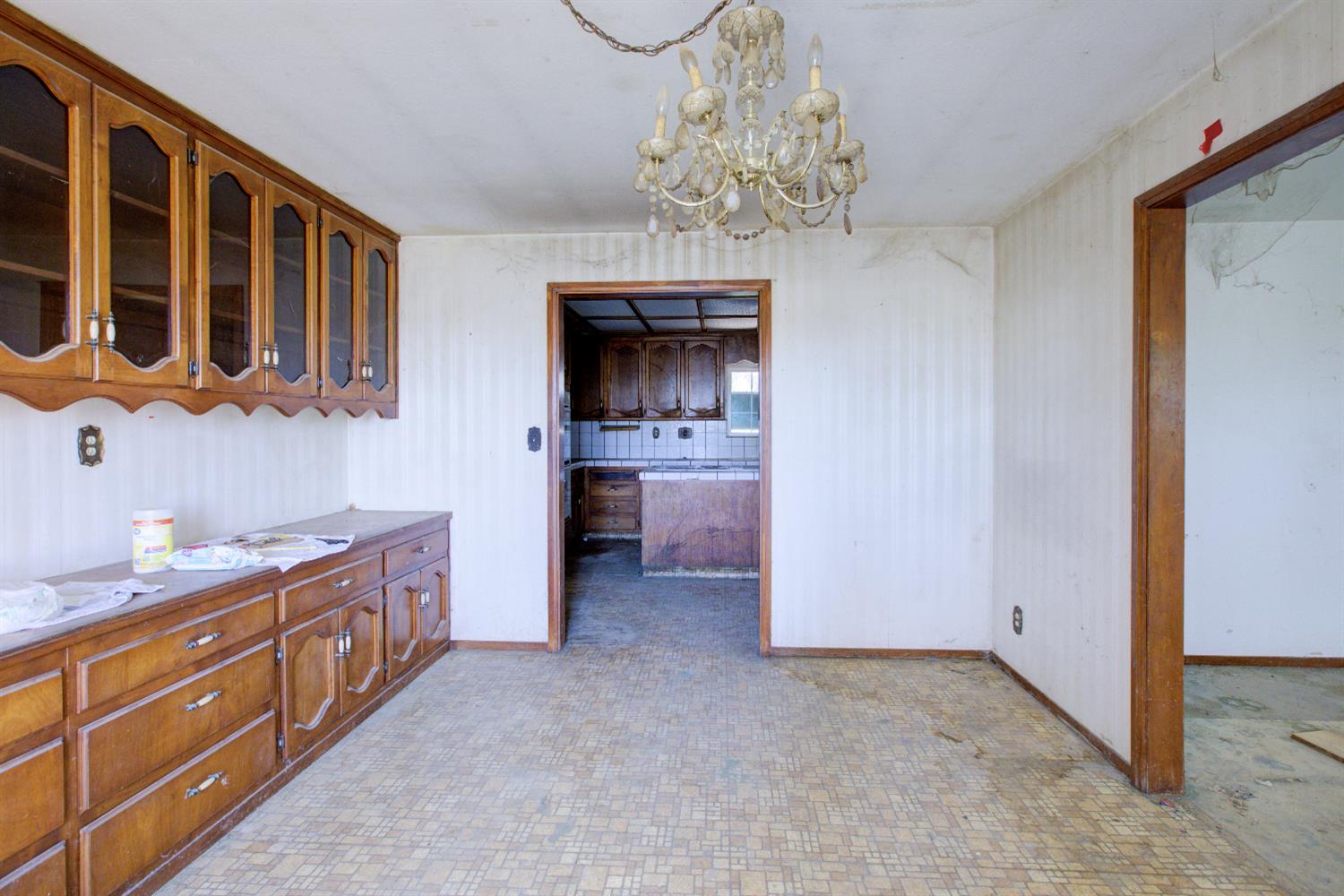873 Loquat Avenue Patterson, CA 95363 - Photo 14 of 35 a kitchen with stainless steel appliances granite countertop a sink and cabinets