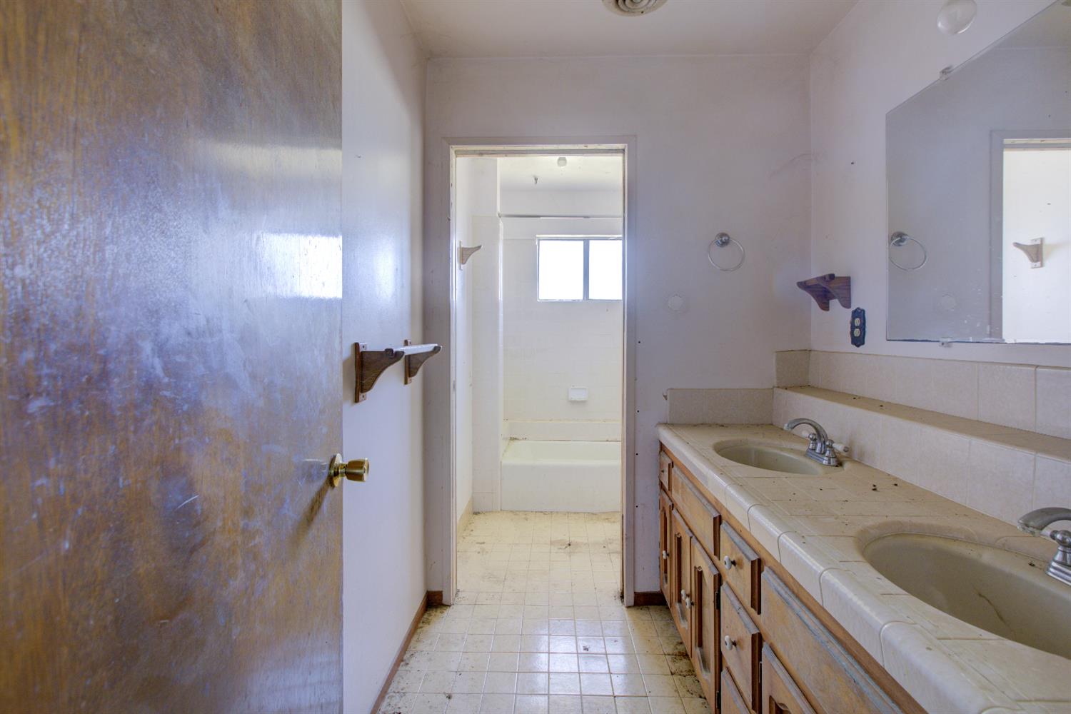 873 Loquat Avenue Patterson, CA 95363 - Photo 25 of 35 a bathroom with a tub sink vanity granite and shower