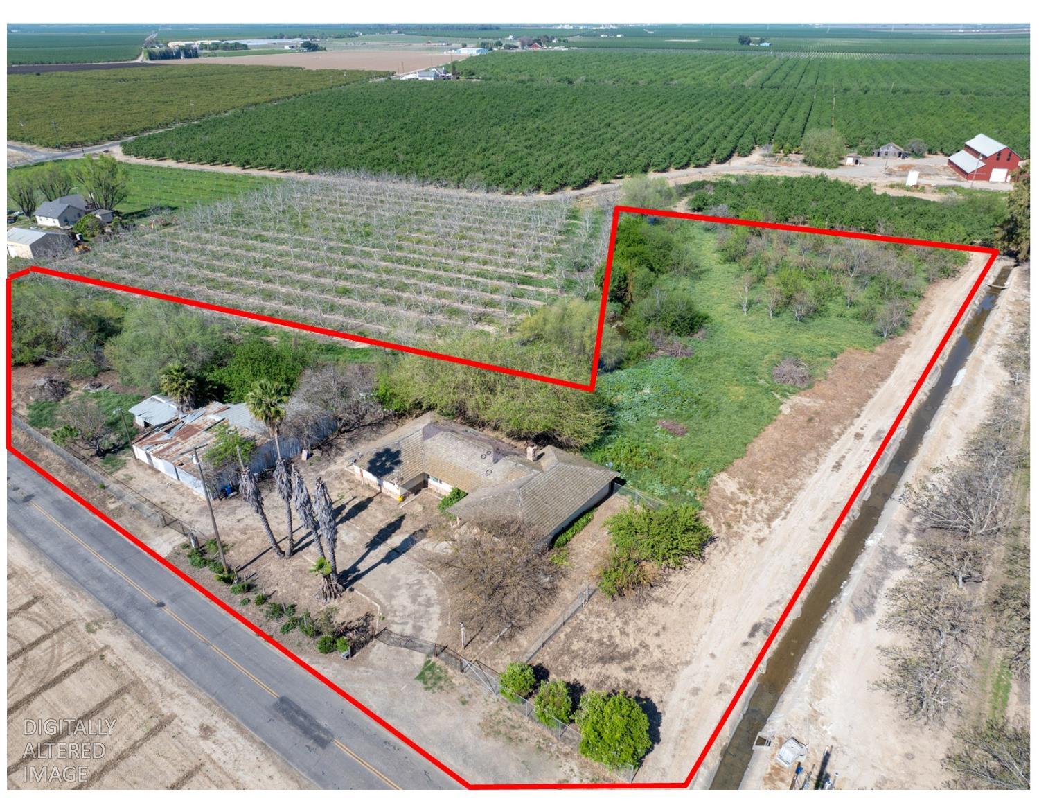 873 Loquat Avenue Patterson, CA 95363 - Photo 7 of 35 a view of a bench in a garden