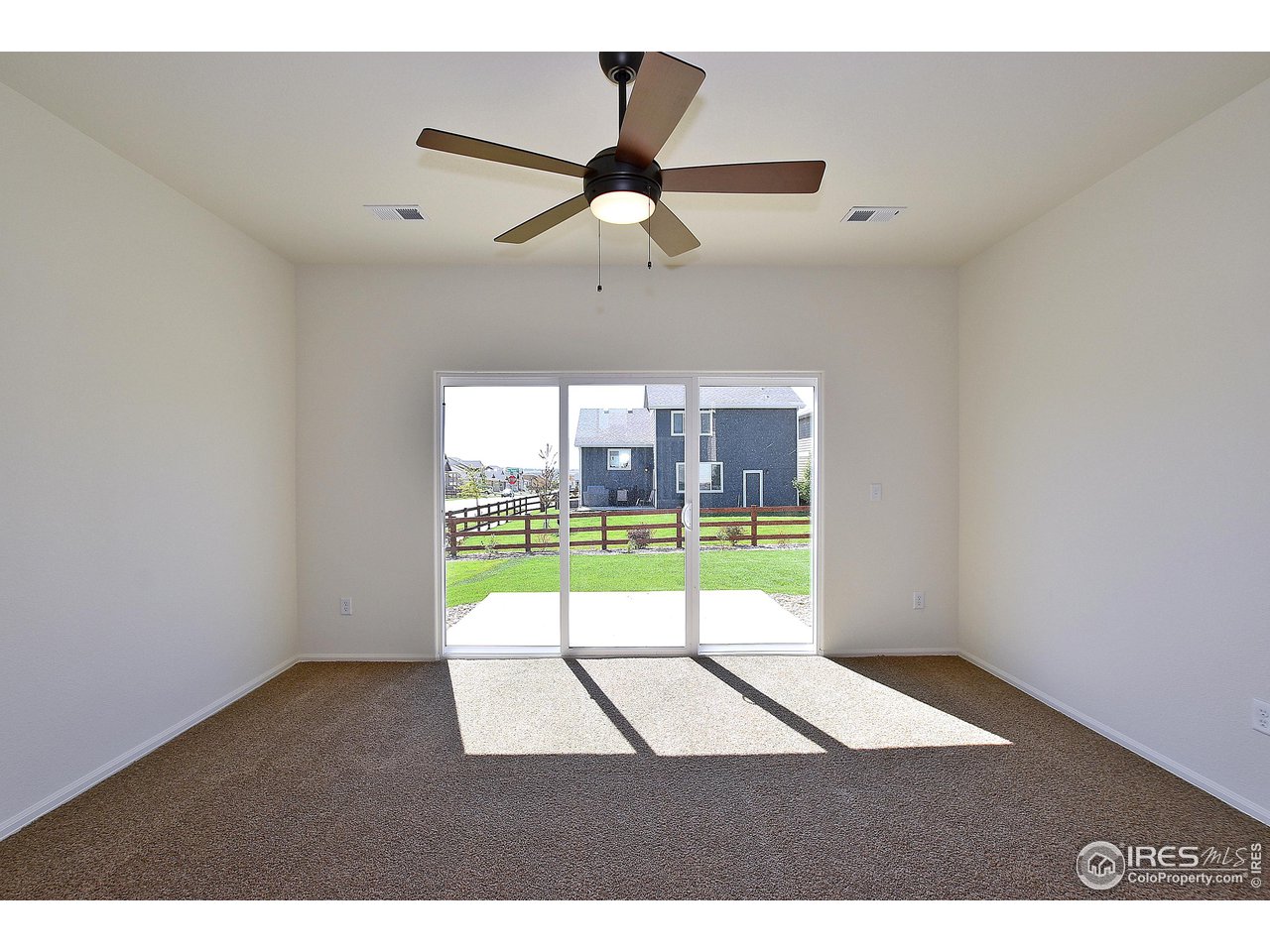 2310 Sublime Drive Windsor, CO 80550 - Photo 16 of 37 a view of an empty room and window
