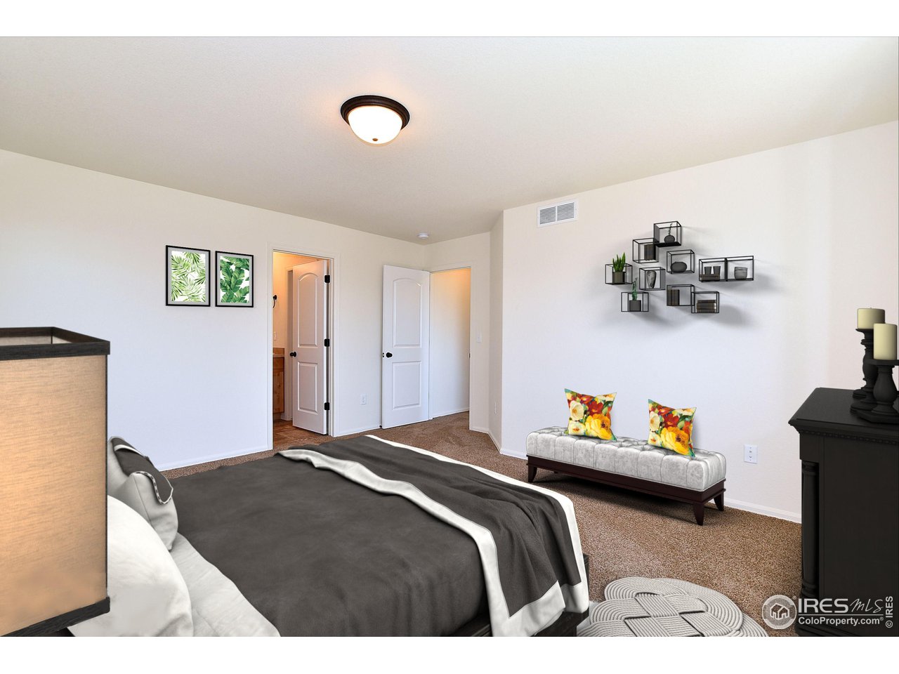2310 Sublime Drive Windsor, CO 80550 - Photo 7 of 37 a bedroom with a bed and a chandelier
