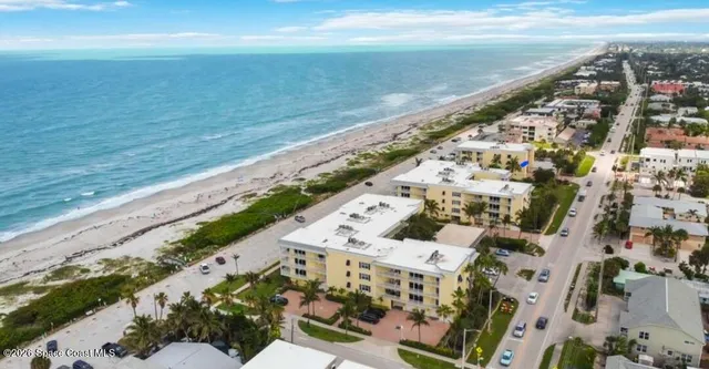 a view of city with ocean