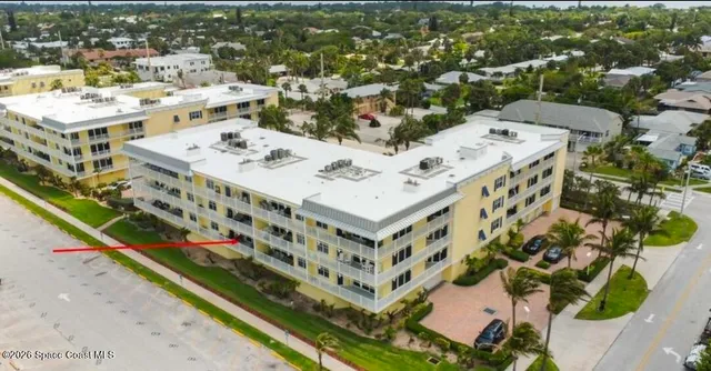 a swimming pool with potted plants