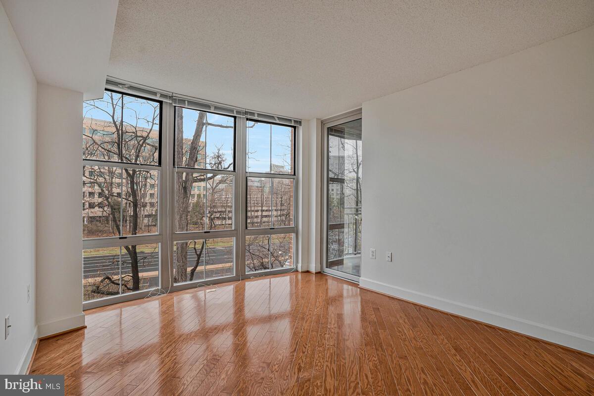 11800 Sunset Hills Road, Unit 514 Reston, VA 20190 - Photo 49 of 57 wooden floor in an empty room with a window