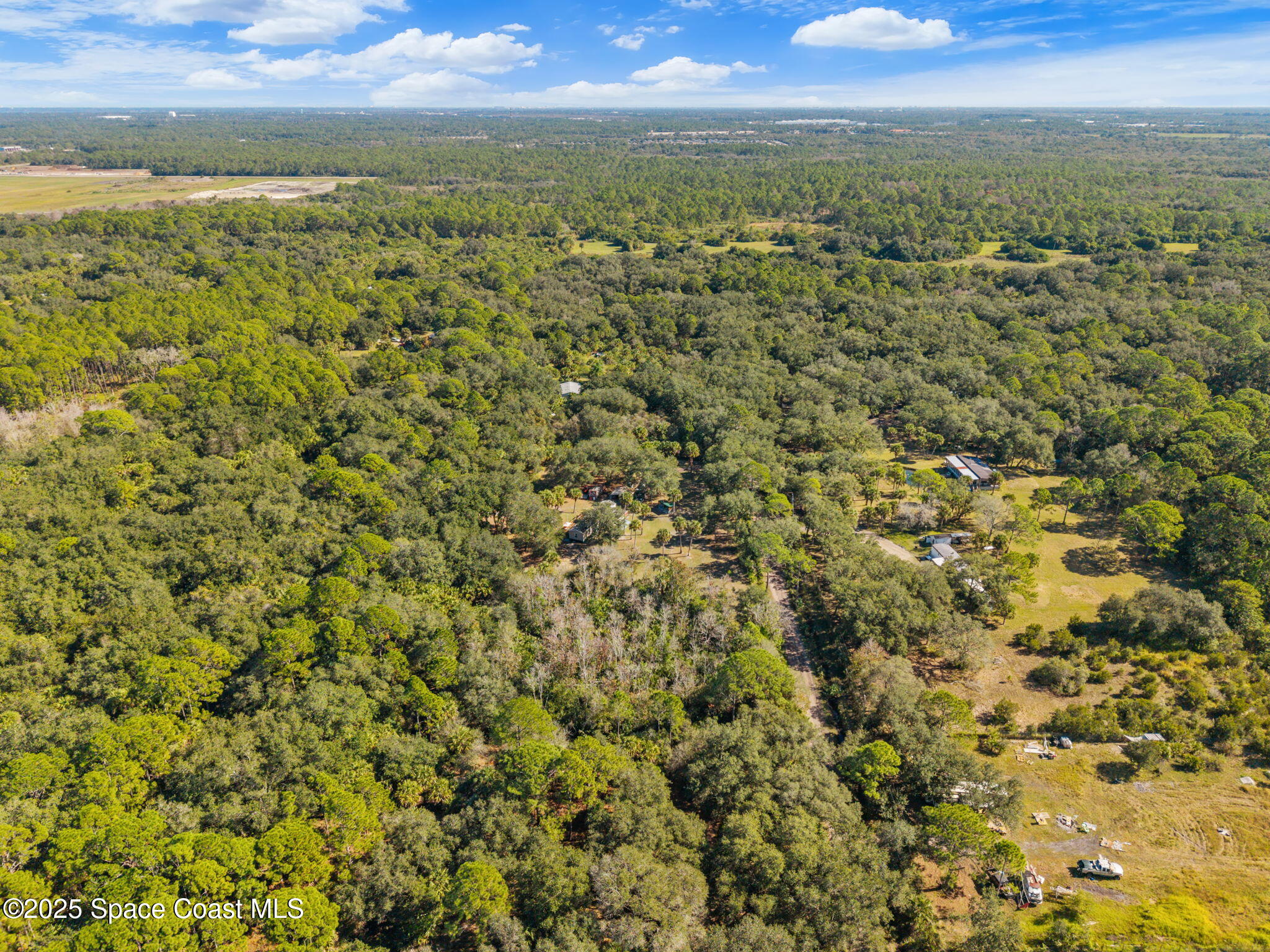 1 Bear Trail Cocoa, FL 32926 - Photo 8 of 13 a view of a city with an outdoor space