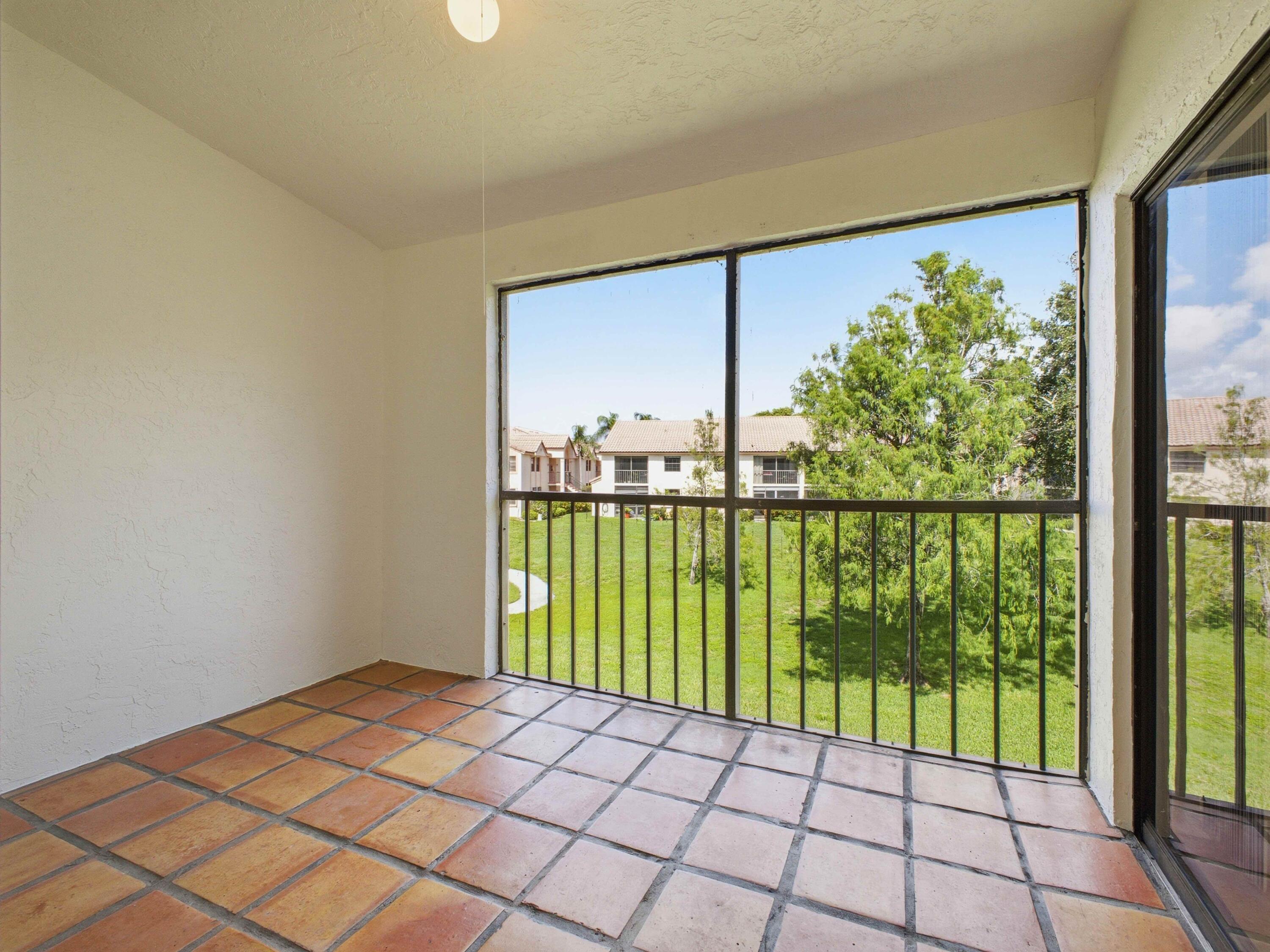321 Norwood Terrace, Unit N221 Boca Raton, FL 33431 - Photo 14 of 36 Screened Balcony