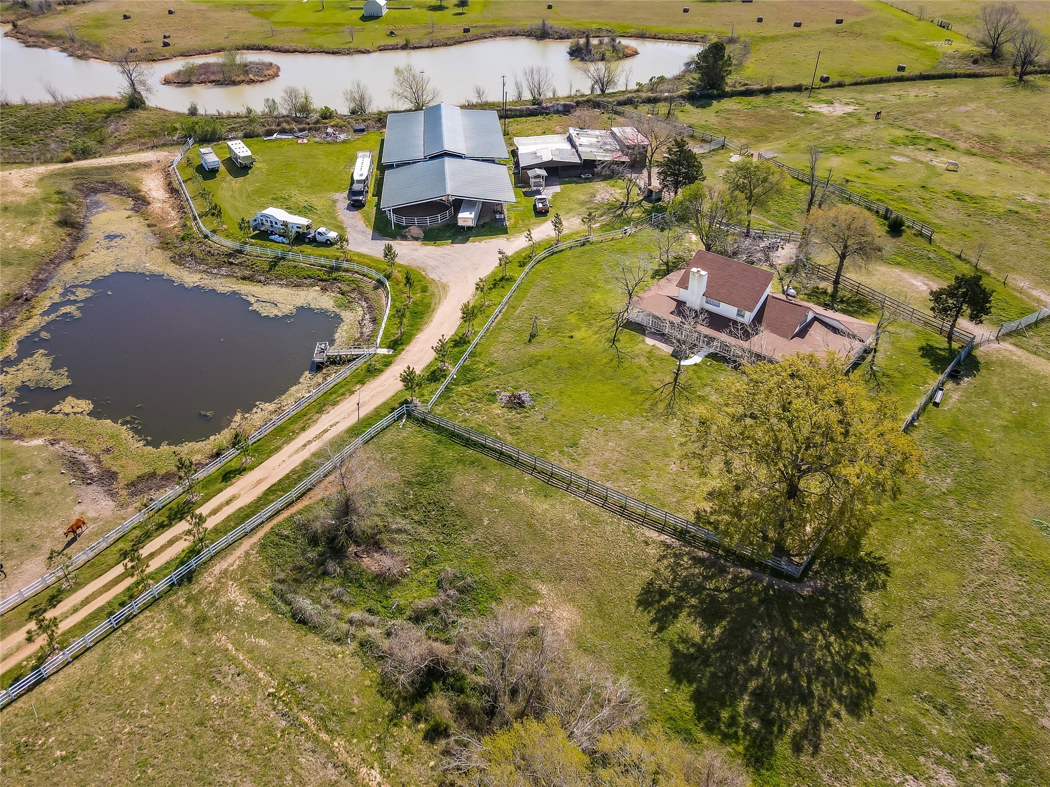 52825 Highway 290 Hempstead, TX 77445 - Photo 3 of 6 an aerial view of residential houses with outdoor space