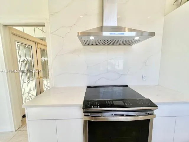 a spacious bathroom with a tub and shower