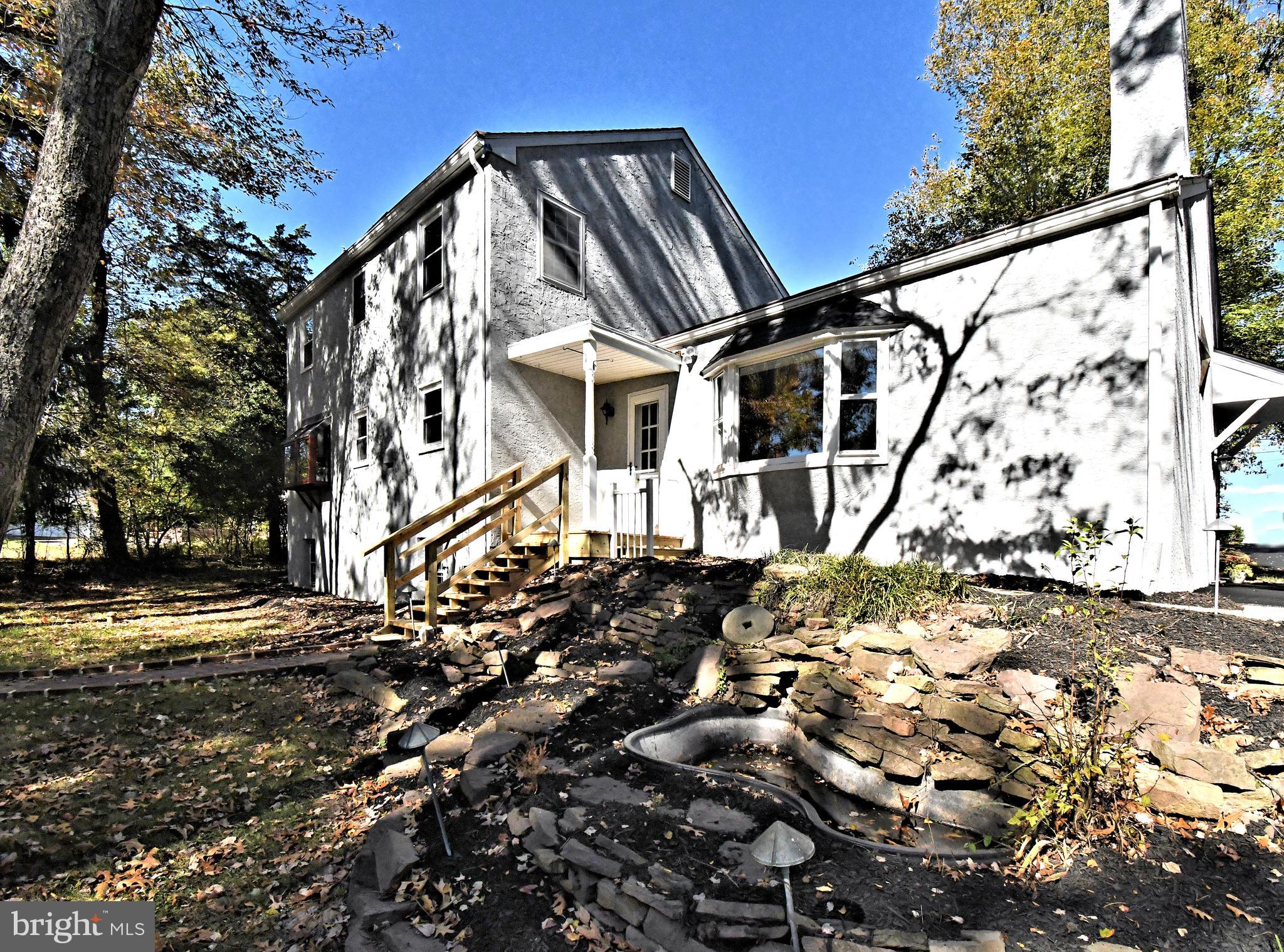 838 Store Road Harleysville, PA 19438 - Photo 54 of 65 a view of a house with a yard