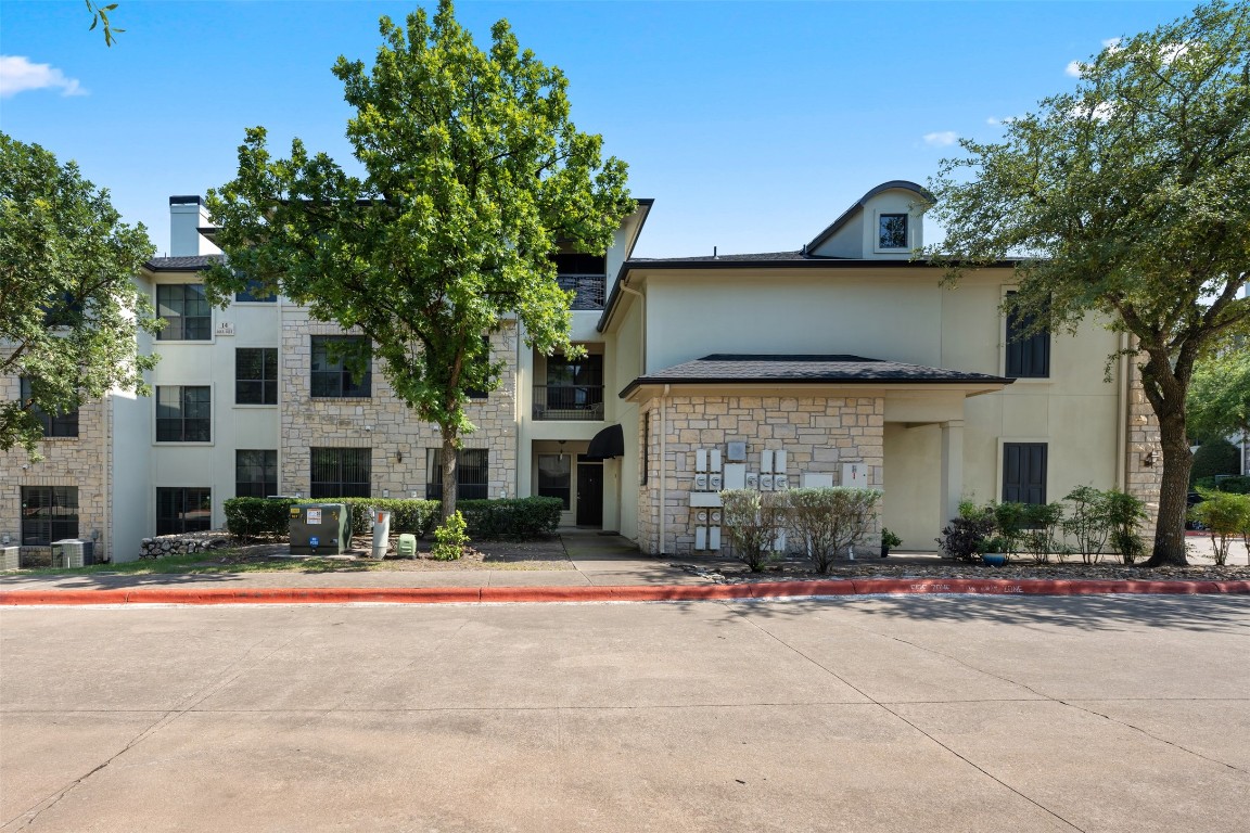 7701 Rialto Boulevard, Unit 1433 Austin, TX 78735 - Photo 4 of 31 a view of the house with a street