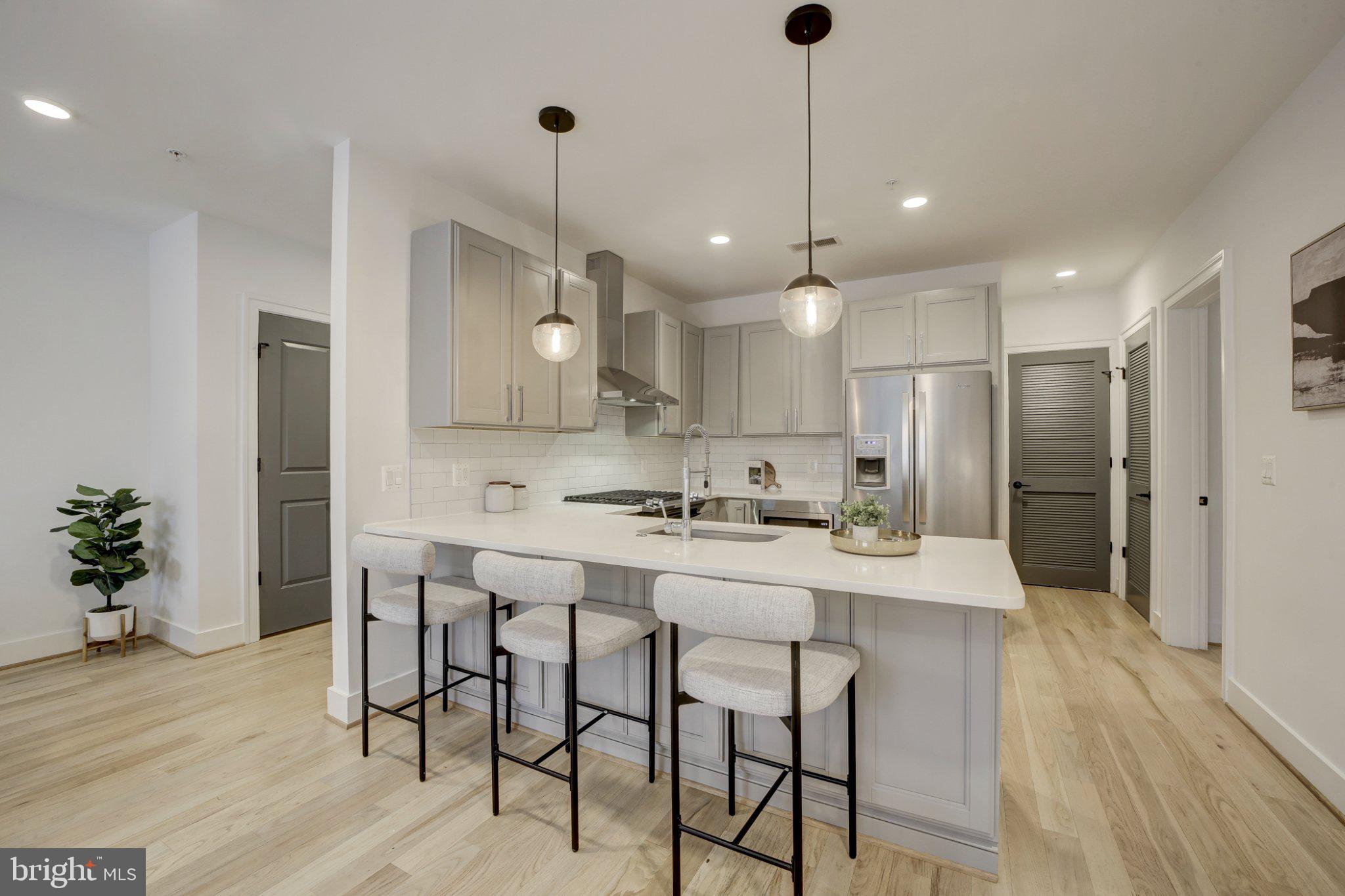 4335 Harrison Street Northwest, Unit 5 Washington, DC 20015 - Photo 12 of 21 Modern kitchen with sleek finishes.
