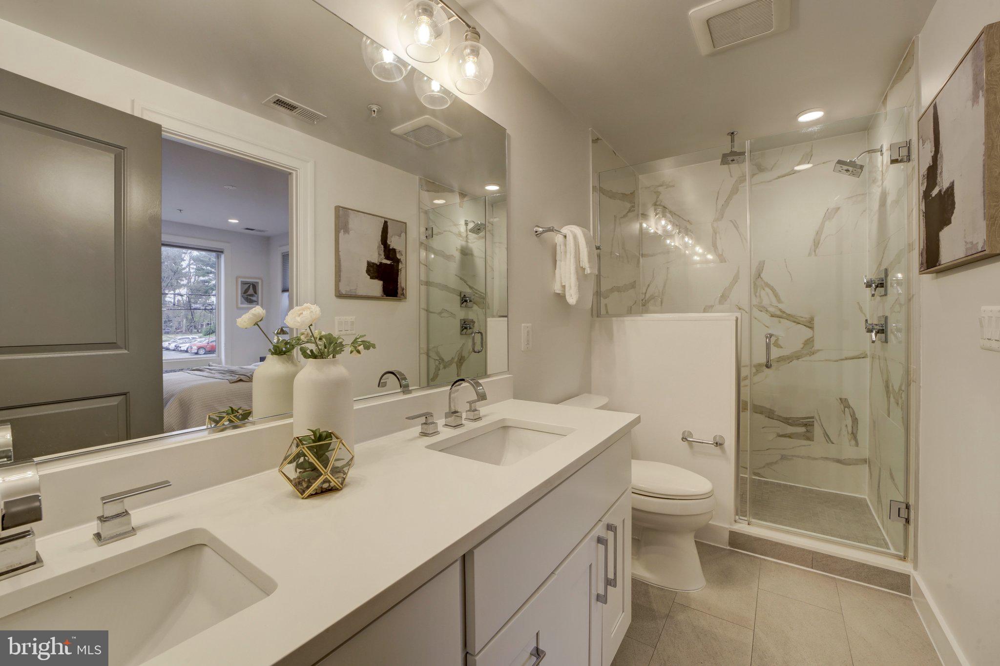 4335 Harrison Street Northwest, Unit 5 Washington, DC 20015 - Photo 17 of 21 Sleek modern bathroom oasis.