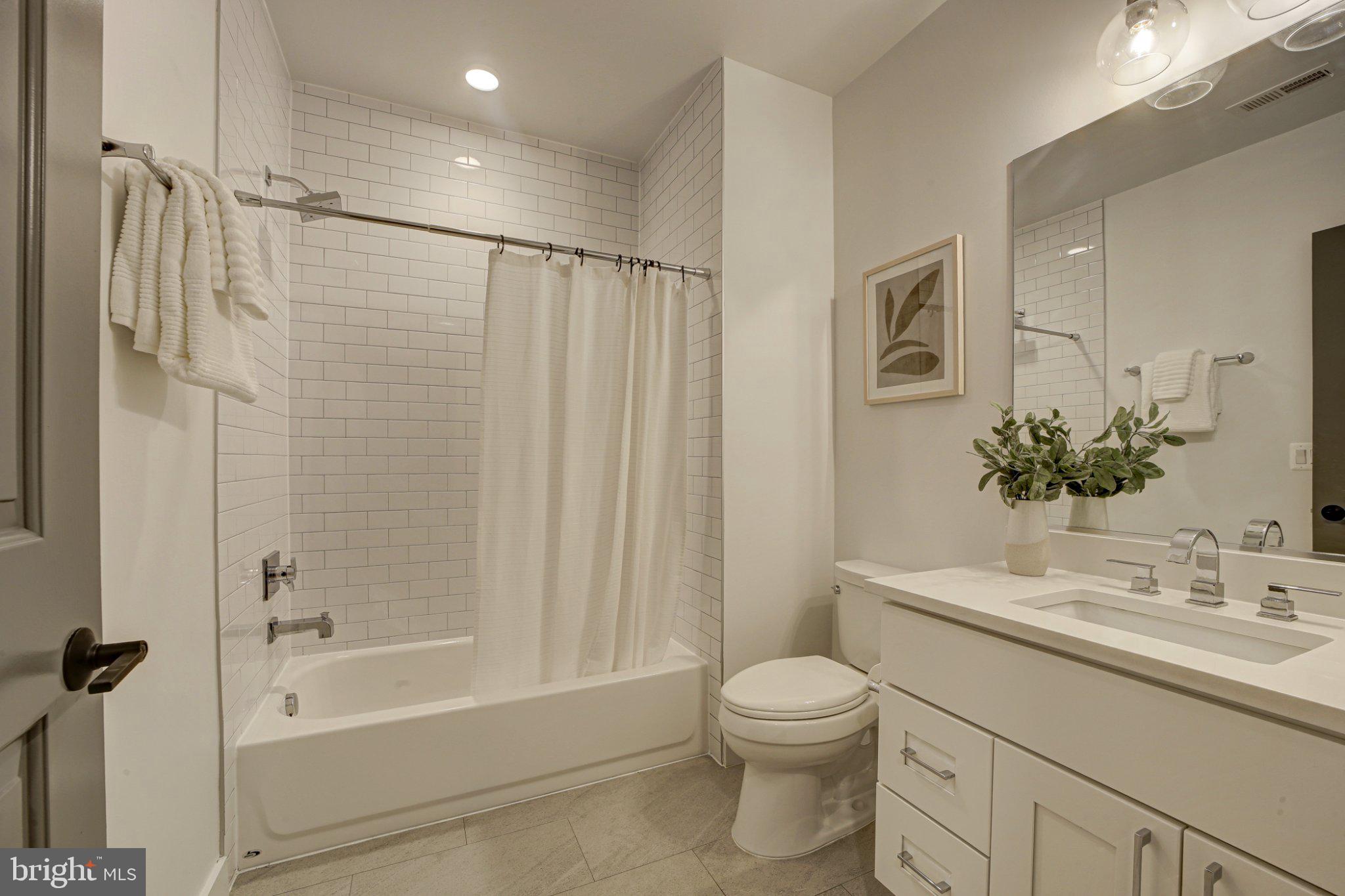 4335 Harrison Street Northwest, Unit 5 Washington, DC 20015 - Photo 19 of 21 Modern bathroom with sleek finishes.