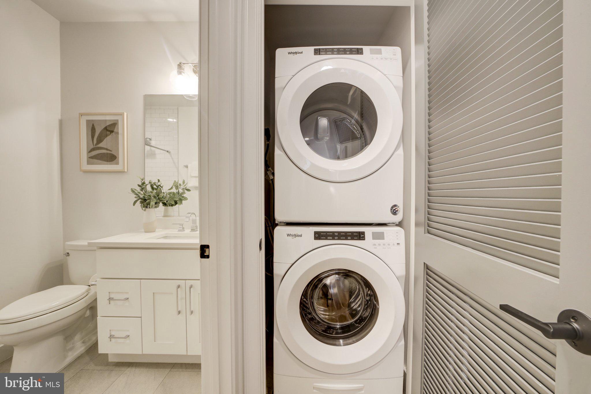 4335 Harrison Street Northwest, Unit 5 Washington, DC 20015 - Photo 20 of 21 Compact laundry nook in modern home.